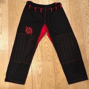 Black and red unique pants